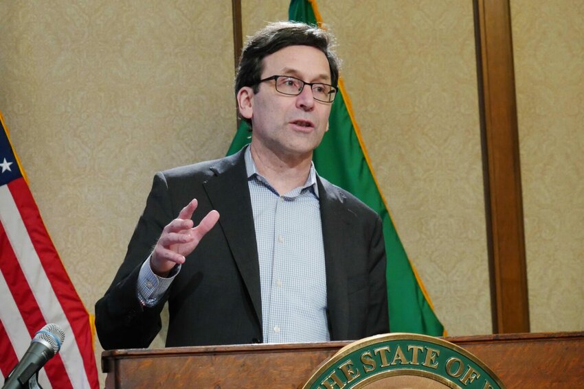 Gov. Bob Ferguson speaks to reporters during a press conference at the state Capitol on Tuesday. (Photo by Bill Lucia/Washington State Standard)