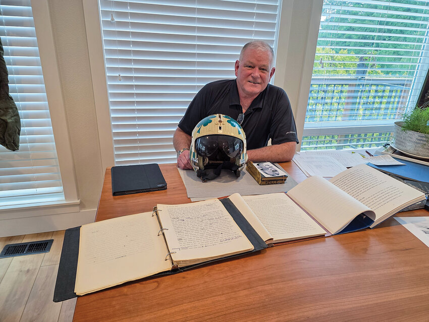 Ridgefield resident Christopher Callahan displays three versions of his stepfather&rsquo;s Vietnam War-era journal that will be available to read in book form in April titled &ldquo;I&rsquo;m Alive: A Young Fighter Pilot&rsquo;s Diary of the U.S. Navy Air War, 1964-1965.&rdquo;