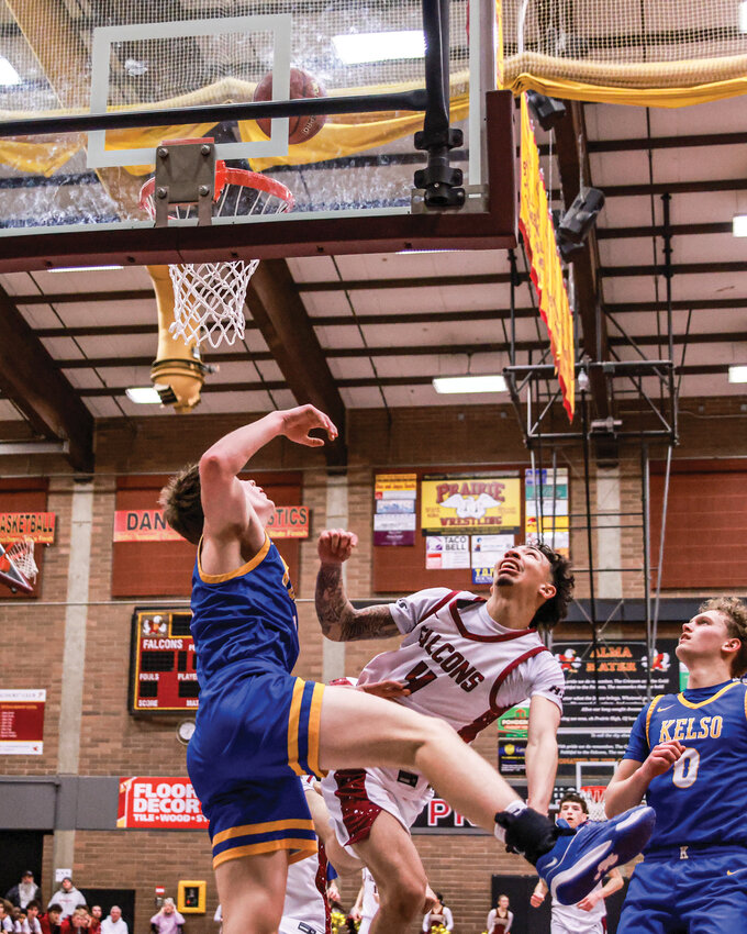 Prairie&rsquo;s Malachi Patton watches a contested lay-up go in the basket during a District 4 tournament game against Kelso High School in February.