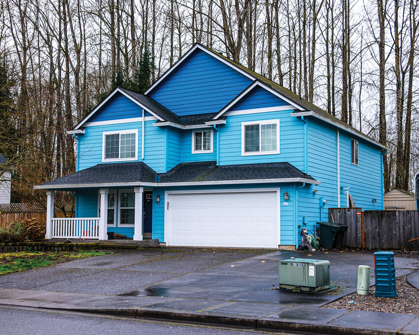 The home of Andrew Brunette in the 200 block of Marty Loop in Woodland sits with evidence tape on the front door on Thursday, March 5. Investigators say evidence of foul play was discovered during a Feb. 24 search warrant served in connection with the death of 34-year-old Tori Garza, of Vancouver. Brunette was arrested and booked on suspicion of first-degree murder and other charges.