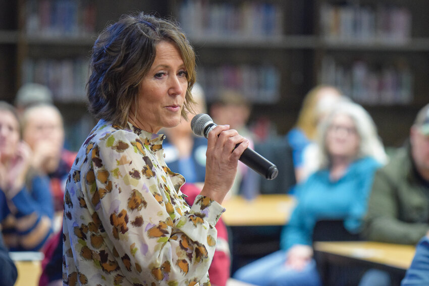 Battle Ground Public Schools Superintendent Shelly Whitten speaks to attendees during a listening session at Battle Ground High School on March 4. The district hosted the meeting to gather community feedback as officials prepare to identify $20 million in budget cuts.