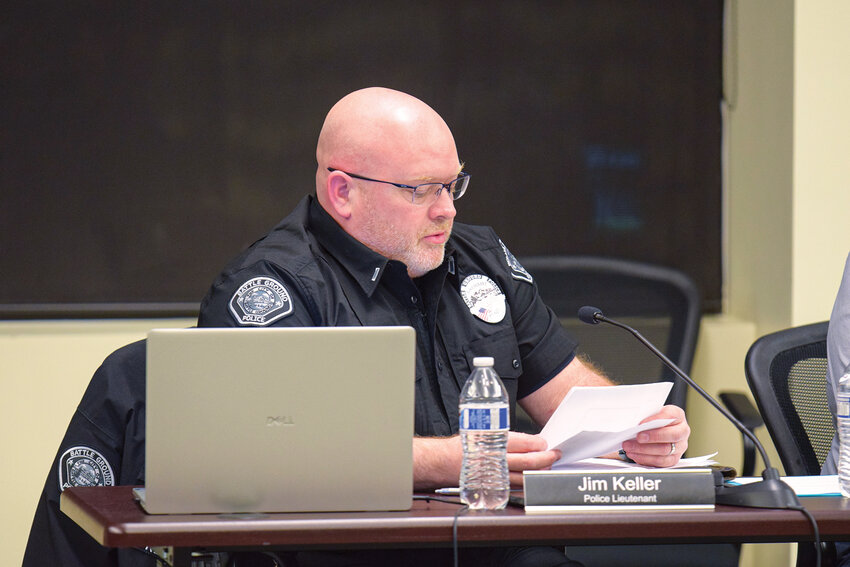 Battle Ground Police Lt. Jim Keller presents a proposed recreational vehicle and trailer storage ordinance during a Battle Ground City Council meeting on Monday, March 2. The council unanimously voted that night to set a public hearing on the ordinance, which would update rules for storing RVs, trailers and boats on residential property.