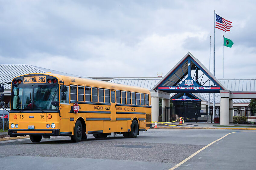 A school bus leaves Mark Morris High School in Longview on March 3, 2026.