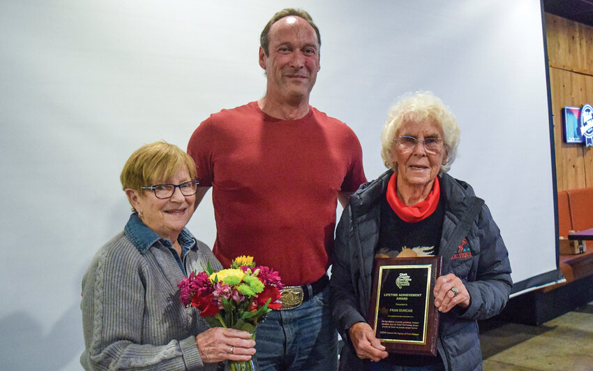 From left, Clark County Executive Horse Council Vice President Alice Heller, President Tyler Castle and Clark County Saddle Club Secretary Fran Duncan stand together March 3 at Prairie Tavern. Castle presented Duncan with the council&rsquo;s first lifetime achievement award.Duncan was surprised by the honor in recognition of decades of service to Clark County&rsquo;s horse community.