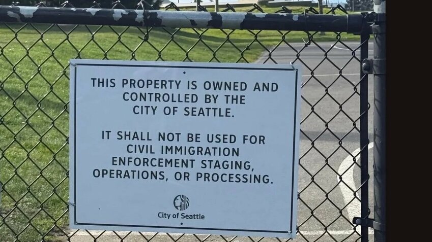 A sign at Jefferson Park in Seattle indicates the property can't be used to enforce civil immigration enforcement, Sept. 25, 2026.
