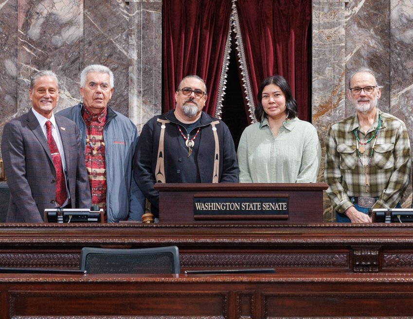 From left, Sen. Jeff Wilson, R-Longview, Gary Johnson, Tony &ldquo;Naschio&rdquo; Johnson, Mary Johnson and Sam Robinson pose for a photo in the Washington state Senate on Monday.