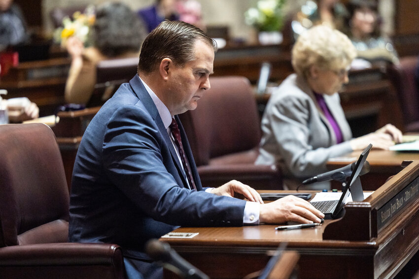 Sen. John Braun, R-Centralia, works on his computer during the last day of the legislative session on Thursday, March 12, in Olympia.