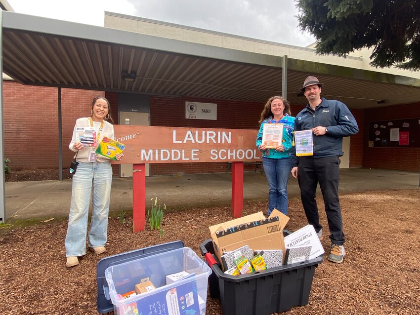From left: Laurin Middle School counselors Amy Nielsen and Marlee Kent received school supplies collected by Battle Ground Rotary and delivered by Rotarians Sean Miller and (not pictured) Jessica Ambrose.