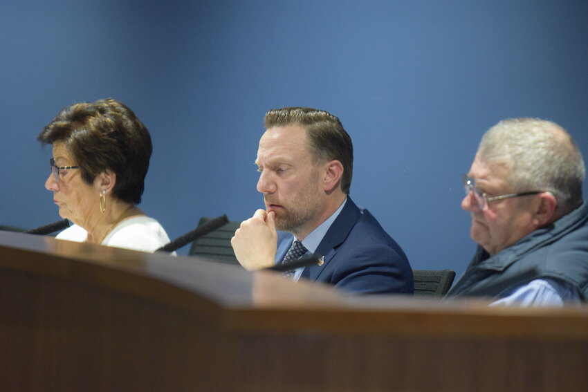 Councilmembers listen to a presentation during a Ridgefield City Council meeting on Thursday, March 12. The council later unanimously approved a new residential rental assistance program after Councilmember Judy Chipman (left) motioned to waive a second reading and adopt the ordinance.