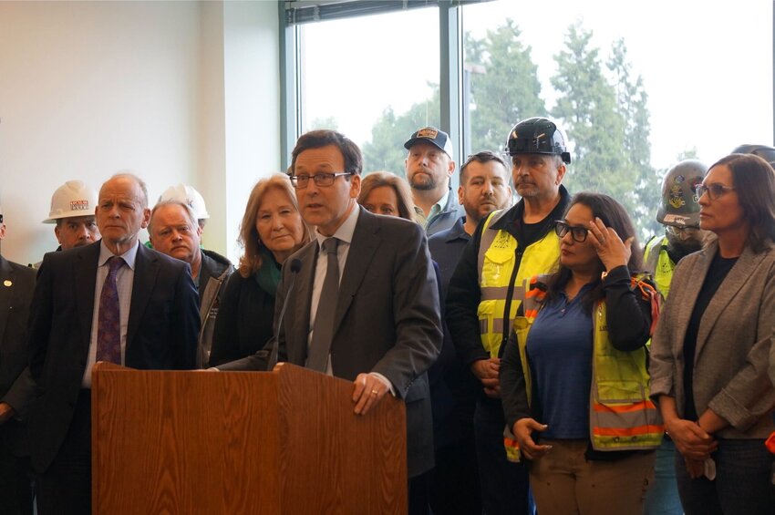 Washington Gov. Bob Ferguson makes remarks during a press conference on the Interstate 5 bridge replacement project on March 17, 2026. (Photo by Alex Baumhardt/Oregon Capital Chronicle)