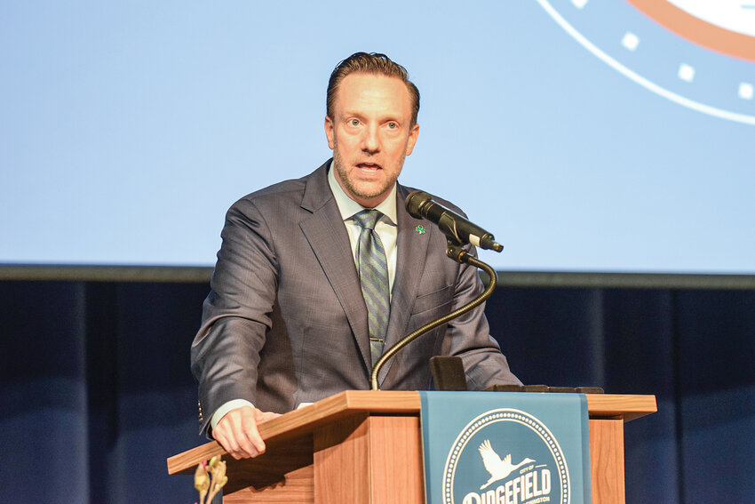 Mayor Matt Cole speaks to attendees during the Ridgefield State of the City on Tuesday, March 17, at Ridgefield High School. Cole opened and closed the event, highlighting growth and introducing the city&rsquo;s new RISE initiative, which focuses on downtown revitalization.