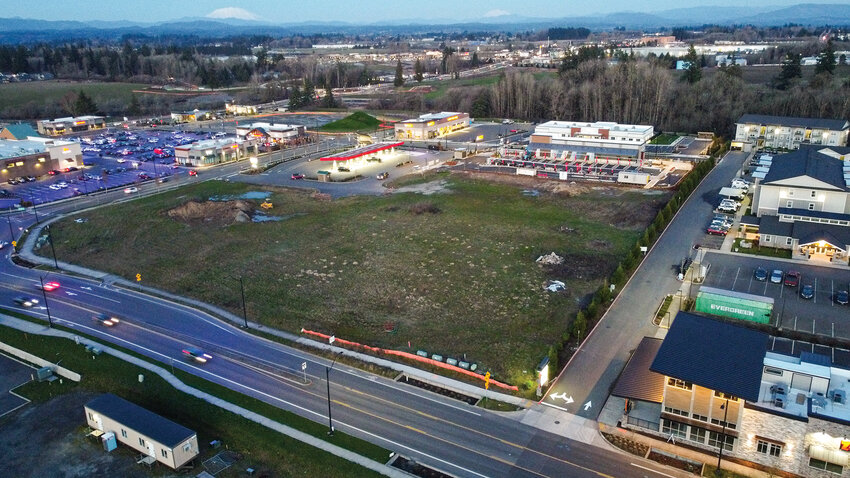 A vacant lot sits south of Rosauers Supermarket near South Royle Road and South 3rd Way in Ridgefield on March 20, 2026. Clark-Cowlitz Fire Rescue plans to build a new fire station at the site to improve emergency response times west of Interstate 5.A vacant lot sits south of Rosauers Supermarket near South Royle Road and South 3rd Way in Ridgefield on March 20, 2026. Clark-Cowlitz Fire Rescue plans to build a new fire station at the site to improve emergency response times west of Interstate 5.