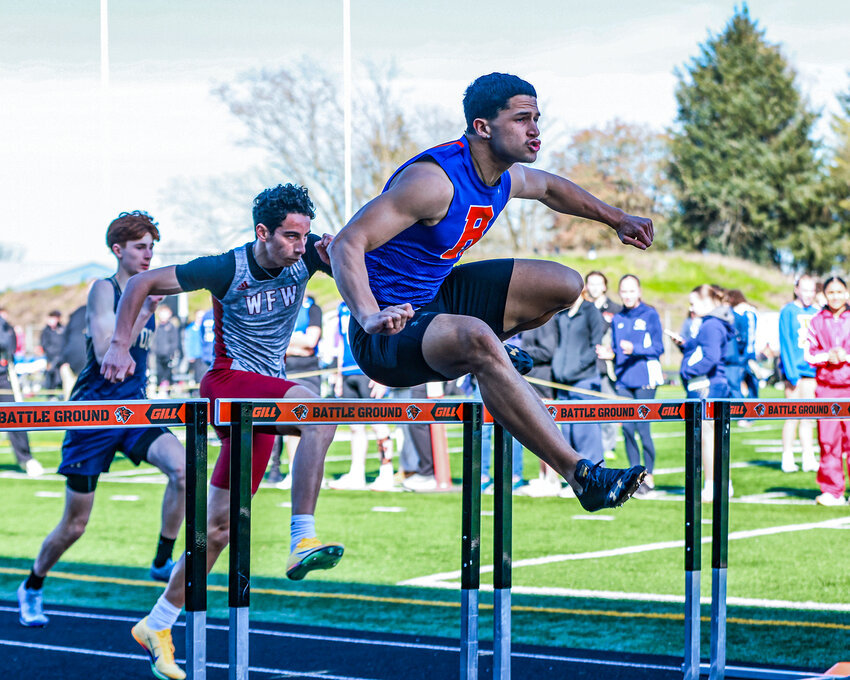 Ridgefield senior Brian McLemore III wins the boys' 110-meter hurdles with a time of 15.14 seconds at the Tiger Invite Track and Field event on Saturday, March 28.