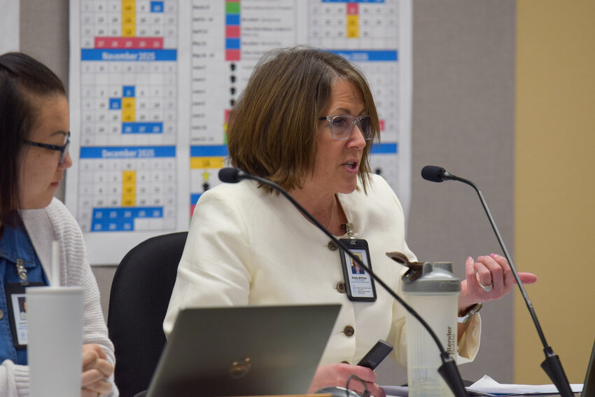 Superintendent Shelly Whitten speaks to the Battle Ground Public Schools Board of Directors during a meeting on Monday, March 23. She presented community feedback on how the district should approach $20 million in budget cuts for the 2026-27 school year.