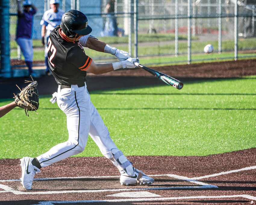 Battle Ground junior Cooper McGowan launches his second home run of the game in the third inning of the Tigers&rsquo; 10-2 win over the Mountain View Thunder on Thursday, April 9.