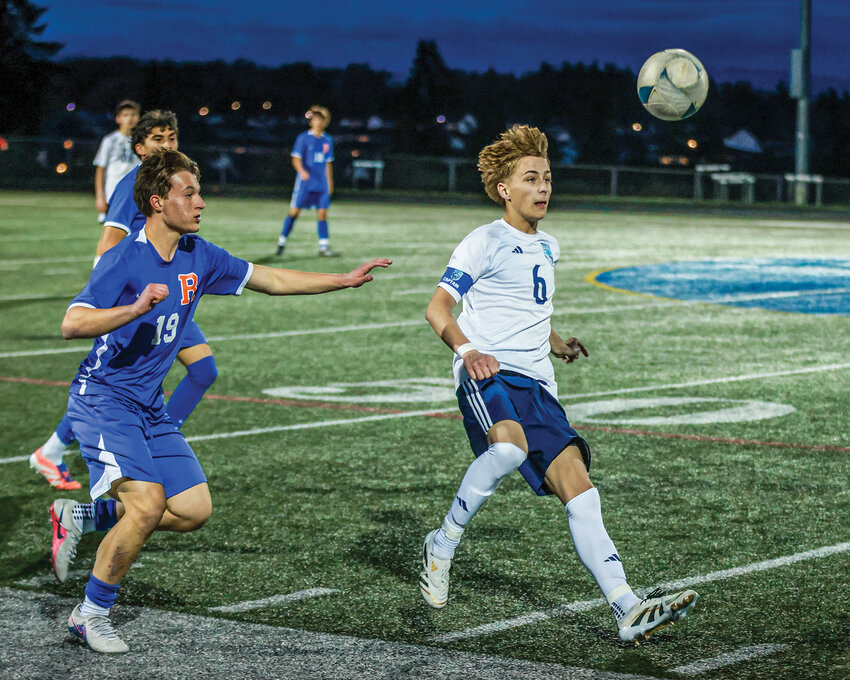 Hockinson senior Ryder Cole-Vogler, right, scored the lone goal in the Hawks&rsquo; 1-0 win over the Ridgefield Spudders on Thursday, April 16.