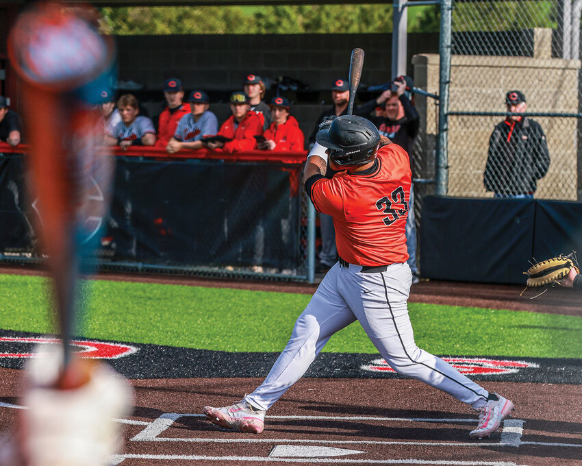 Battle Ground senior James Gill III watches his home run sail over the right field fence in the Tigers&rsquo; 8-4 series win over Camas High School on Thursday, April 16.