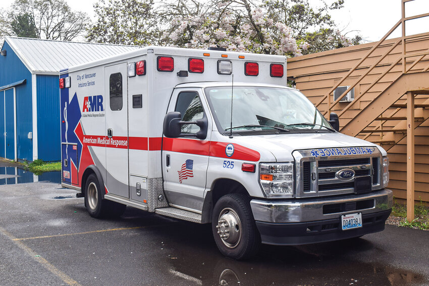 An American Medical Response ambulance sits parked outside the company&rsquo;s Hazel Dell facility. EMS District 2, which contracts with AMR for ambulance services, is working to determine how it will handle new administrative and financial responsibilities following recent changes to its governing board.