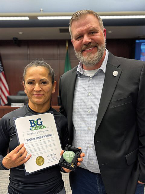 Battle Ground Mayor Eric Overholser presented the first BiG Heart Award on April 20 to Virginia Mendez-Rodeman of Battle Ground Martial Arts Academy.