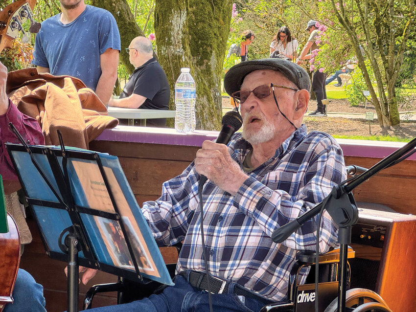 Dick Pederson sings during a performance at the Hulda Klager Lilac Gardens on Saturday, April 18. At 93, he remains the vocal centerpiece of the Fargher Lake Boys.