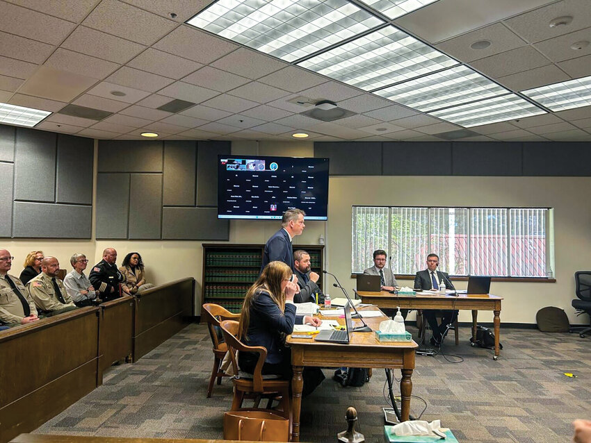 Mark Lamb, the attorney for four eastern Washington sheriffs, speaks in Thurston County Superior Court against a new law setting heightened eligibility standards for sheriffs as several county sheriffs observe on Wednesday, April 29, 2026.
