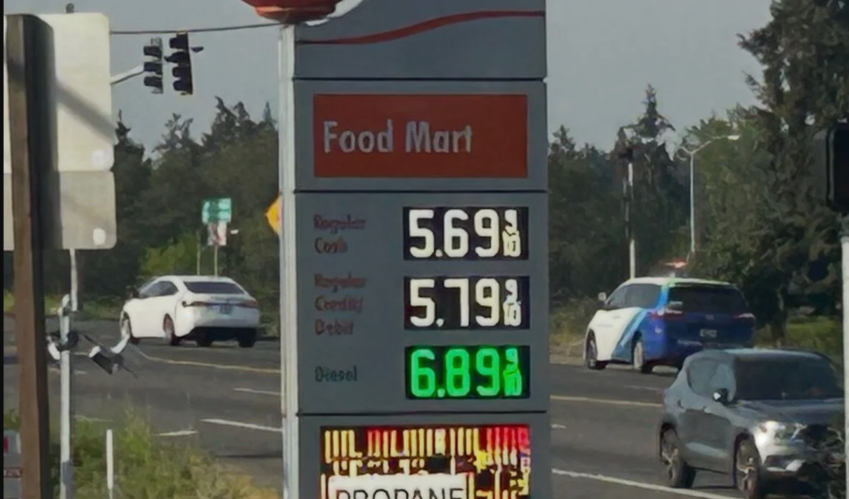 A sign displays gas prices in Tacoma on May 1, 2026. Washington drivers are paying the second-highest gas prices in the nation, at $5.67 a gallon on average as of Monday.