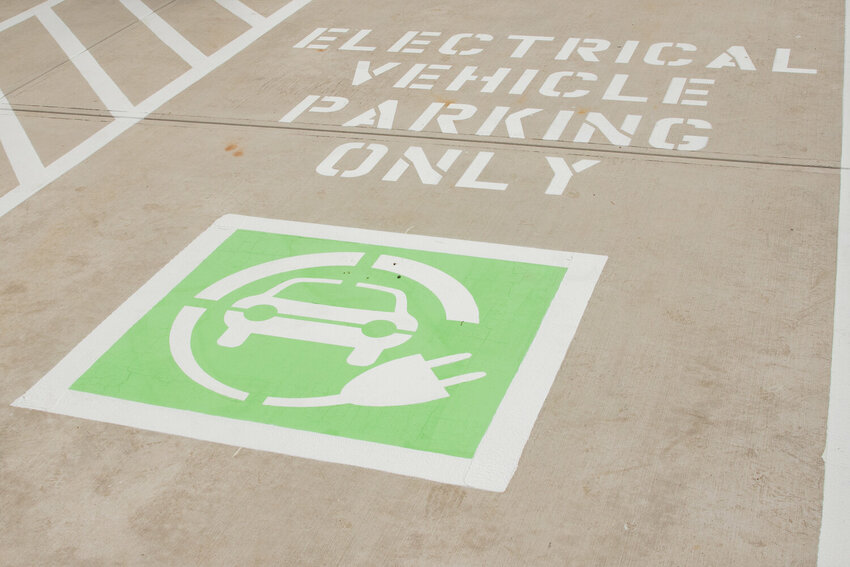 A designated electric vehicle parking spot is pictured at the new Mineral Mobility Hub on Friday, May 8, behind the Mineral Lake Market.