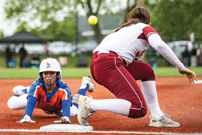 Ridgefield&rsquo;s Gracie Olmos (9) slides to third base during a 2A District 4 Semifinal against W.F. West at Recreation Park in Chehalis on Thursday, May 14.