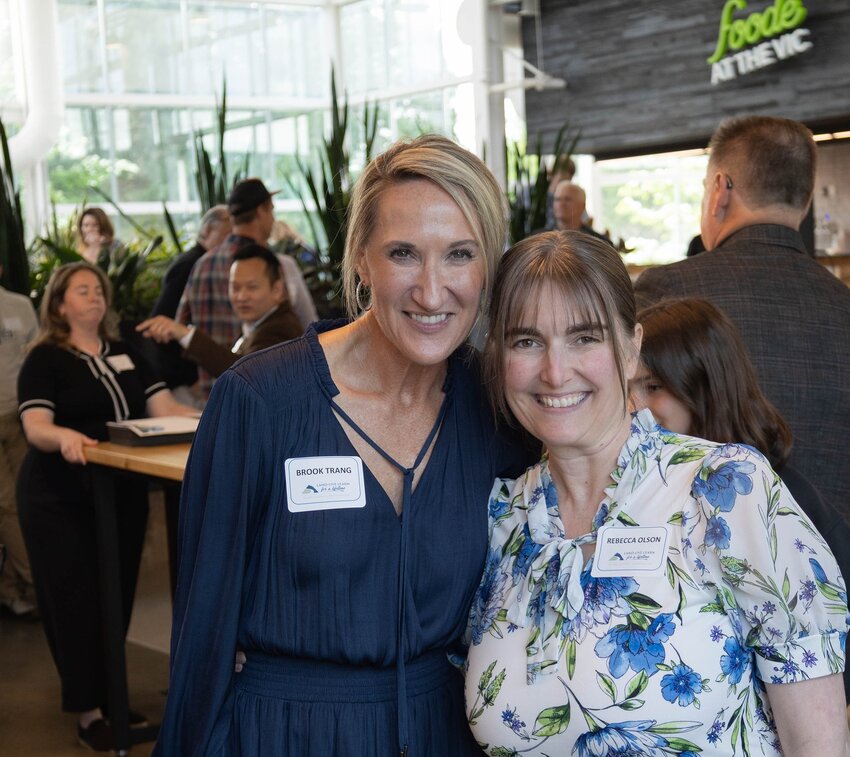 Brook Trang, left, executive director of Read Northwest, and Daybreak Middle School counselor Rebecca Olson received Learn Here Hero Awards from Identity Clark County.