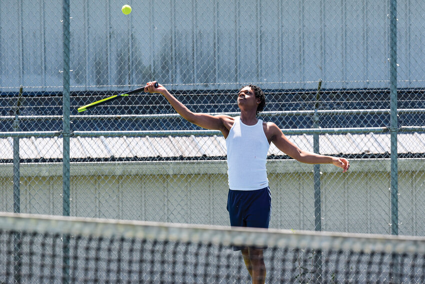 A player serves the ball at Holley Park&rsquo;s tennis courts in La Center. The city recently restriped the courts as part of larger upgrades planned under La Center&rsquo;s parks plan through 2030.