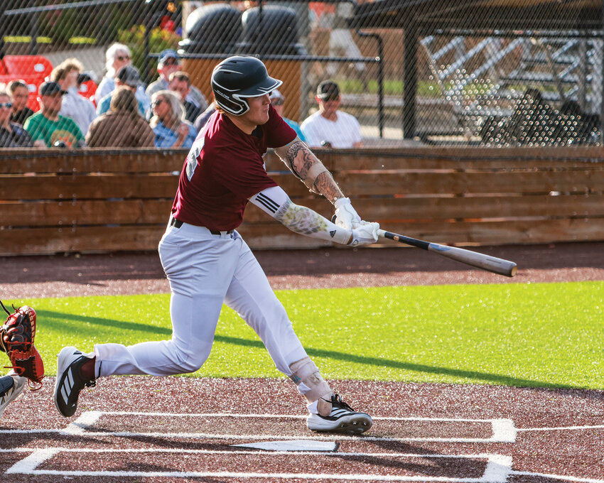 Former Ridgefield High School star baseball player Liam Ostrom hits a hustle double in his debut at-bat for the Ridgefield Raptors of the collegiate wood bat summer league, the West Coast League, on Thursday, May 28.