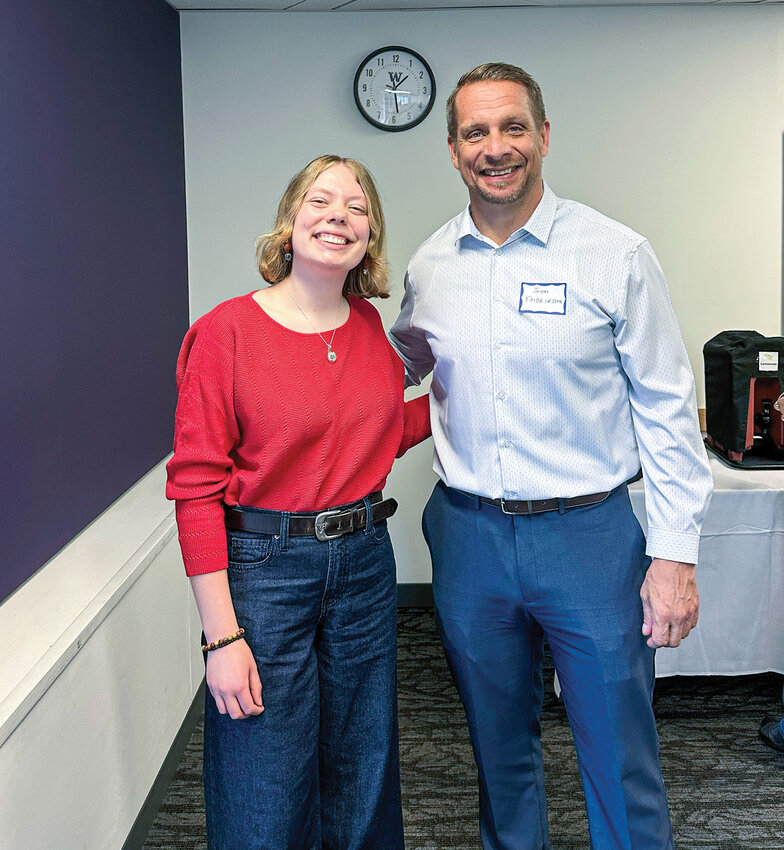 Battle Ground High School graduate Elizabeth McAleer, left, nominated history teacher Jonas Fridriksson for a University of Washington award recognizing outstanding history and social studies instruction.