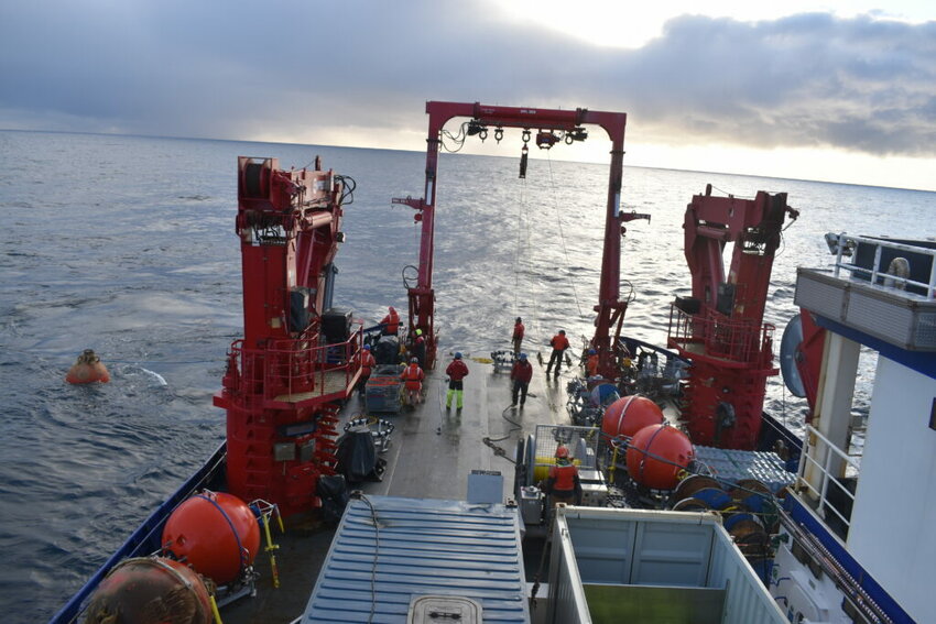 Workers retrieve a data-recording instrument in the Gulf of Alaska. The instruments have been deployed through the Ocean Observatories Initiative, which began operating in 2016 and was to continue for three decades. The National Science Foundation, under the Trump administration, plans to dismantle portions of the ssystem, including instruments in Alaska that are used to monitor weather events and help manage seafood harvests.