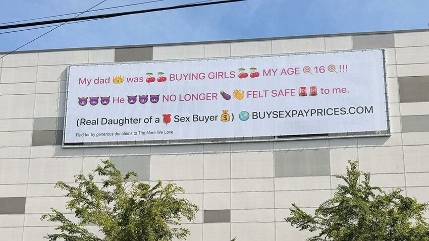 An anti-sex trafficking billboard along Aurora Avenue North in Seattle. The sign promotes awareness of commercial sexual exploitation in an area long associated with prostitution and trafficking activity.