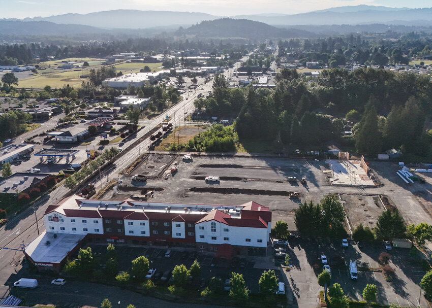 Construction activity takes place on Friday, June 19, at the West Main Commons mixed-use project in Battle Ground as the site develops one of the last remaining vacant Main Street frontage properties between 20th Avenue and Grace Avenue in the city&rsquo;s core.