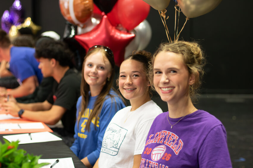 Battle Ground and Prairie seniors sign letters of intent during a signing ceremony to continue their athletic careers in college.