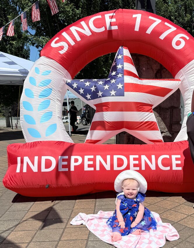 Rojean Parrish&rsquo;s 7-month old granddaughter, Lainey, celebrates Independence Day at the Ridgefield Fourth of July celebration.