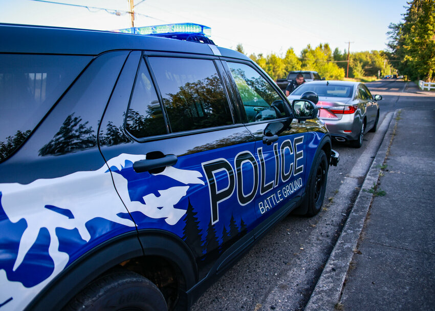 Battle Ground police officer Jeff Cabanting-Rafael performs a traffic stop on Southwest 20th Avenue in June 2025.