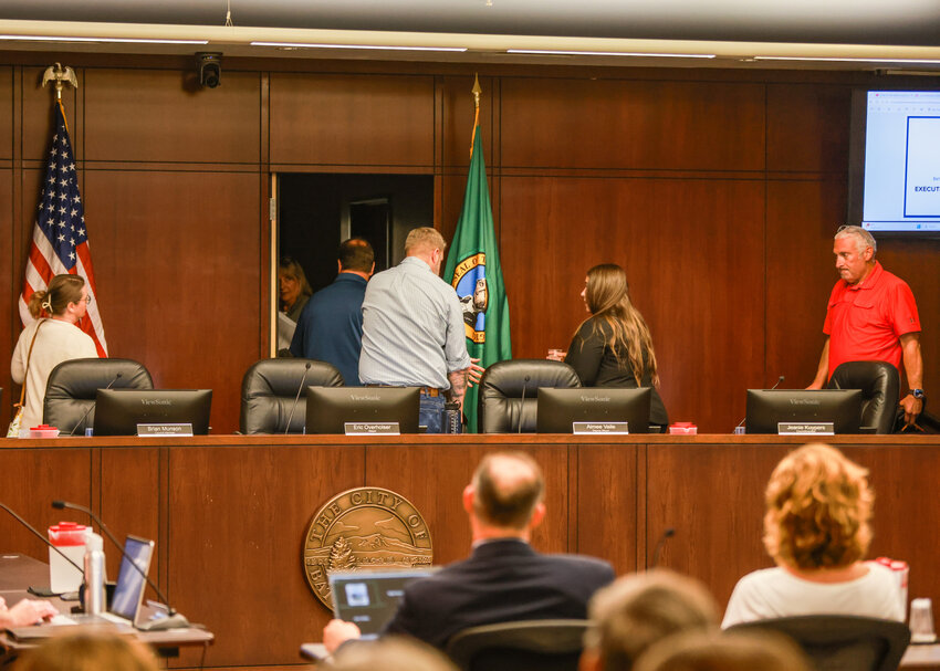 Battle Ground City Councilors enter an executive session prior to voting 4-3 to terminate City Manager Kris Swanson at a special meeting on Wednesday, Aug. 5.