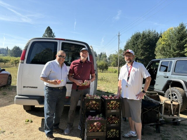 Volunteers harvested more than 450 pounds of fresh apples and pears at Brush Berry Farm. The produce will be distributed to local school cafeterias.