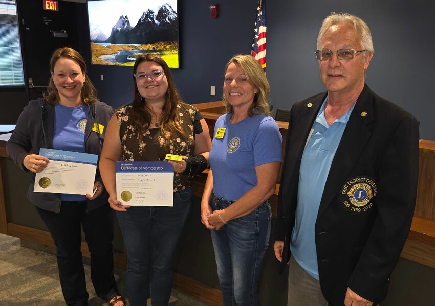 From left, T.J. Wilcox-Olson, Jennifer Fletcher, Stacy Mueller and Stephen Staudinger pose for a photo during the Ridgefield Lions Club&rsquo;s monthly meeting. Fletcher was welcomed as a new member.