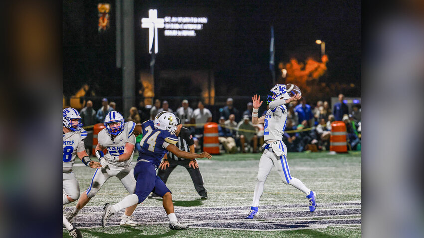 La Center senior running back Jack Glackler commands three Seton Catholic defenders to tackle him in the Wildcats&rsquo; 14-7 loss to the Seton Catholic Cougars on Friday, Oct. 16.