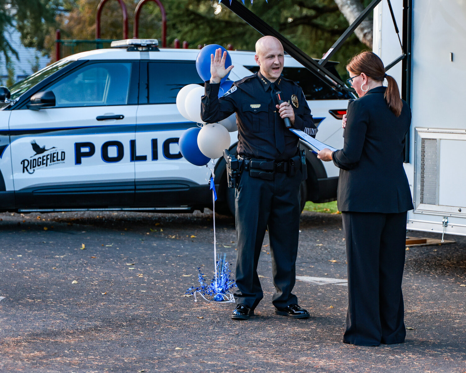 Ridgefield Police Chief Jim Quackenbush is sworn in at the Meet the Chief event at Davis Park in Ridgefield on Tuesday, Sept. 22.