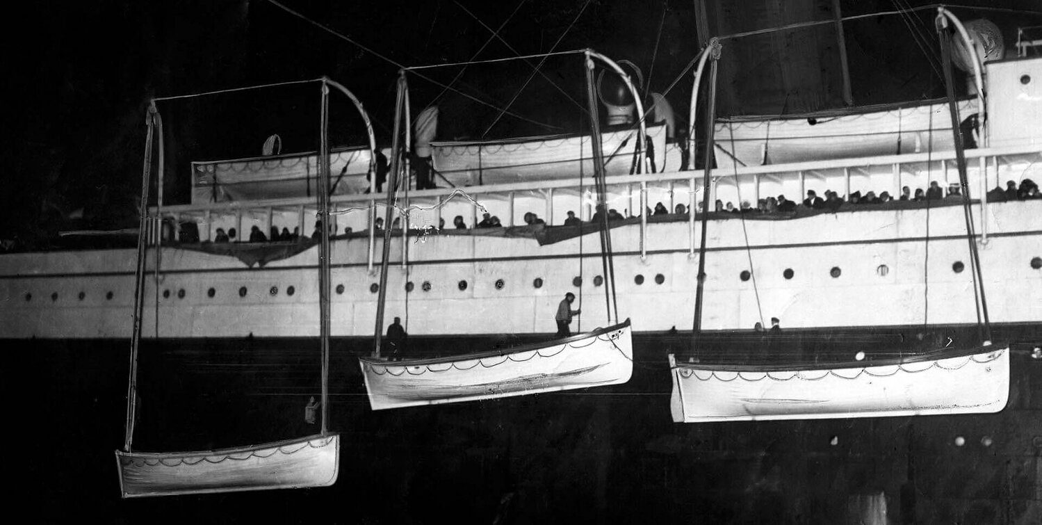 Lifeboats from the RMS Titanic are uploaded to the RMS Carpathia in the hours after the luxury liner sank in April 1912.